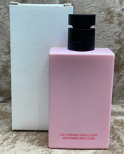 Load image into Gallery viewer, VALENTINO DONNA BORN IN ROMA  Moisturizing Body Lotion 3.4 Fl. Oz. 100 Ml. Cardboard Box.

Valentino Donna Born In Roma by Valentino is a Amber Floral fragrance for women. Valentino Donna Born In Roma was launched in 2019. Top notes are Black Currant,
